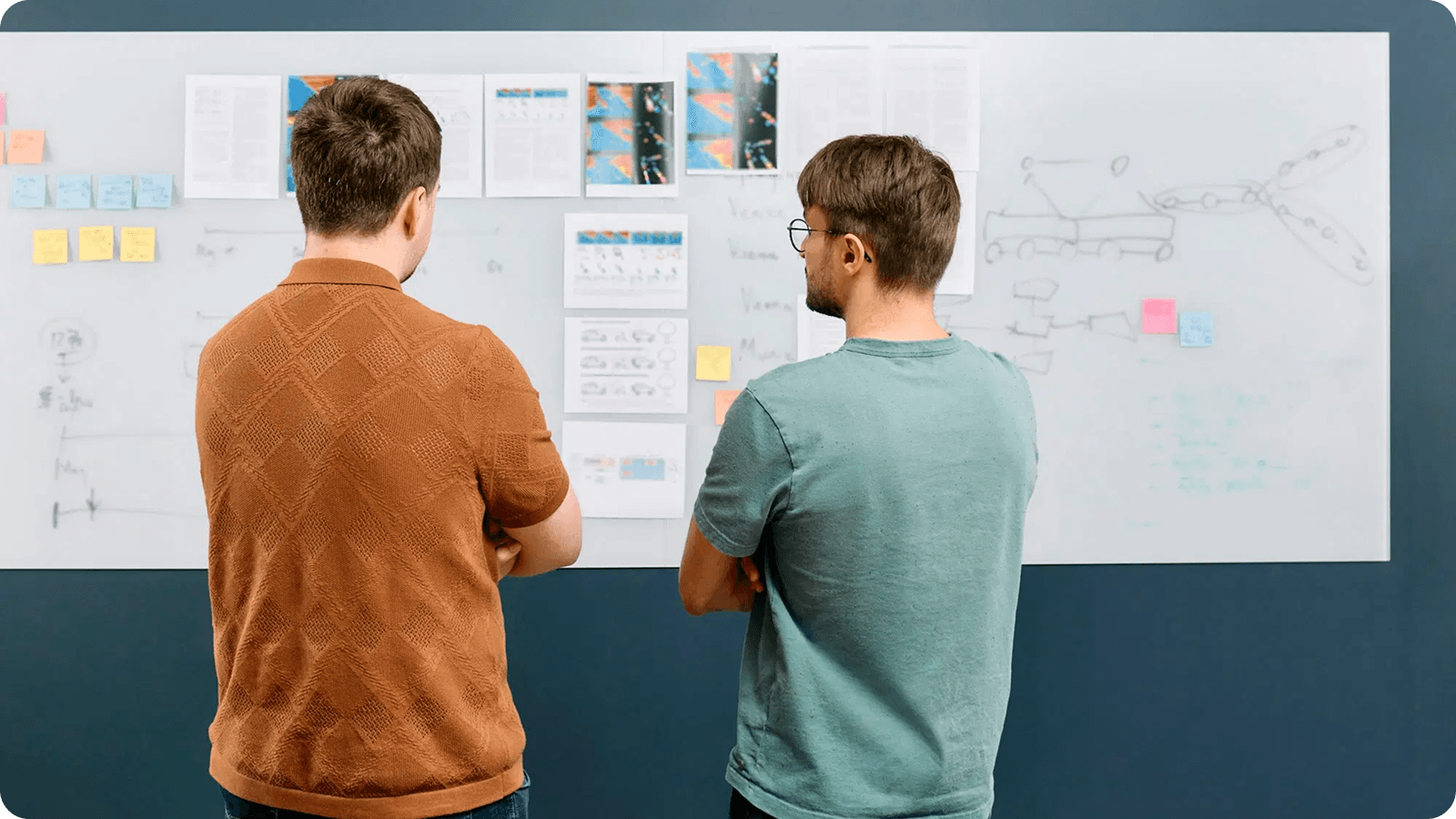 Team members translating ideas into policy strategy.